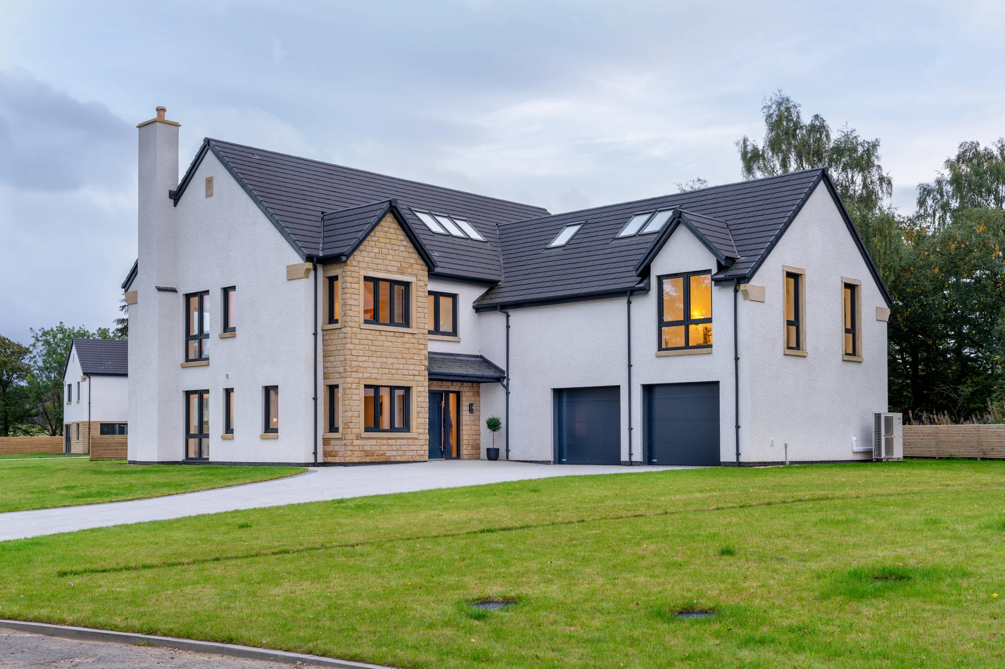 House Type 2, with natural stone, white render and generous gardens